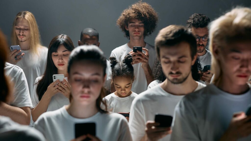 photo of people engaged on their phones